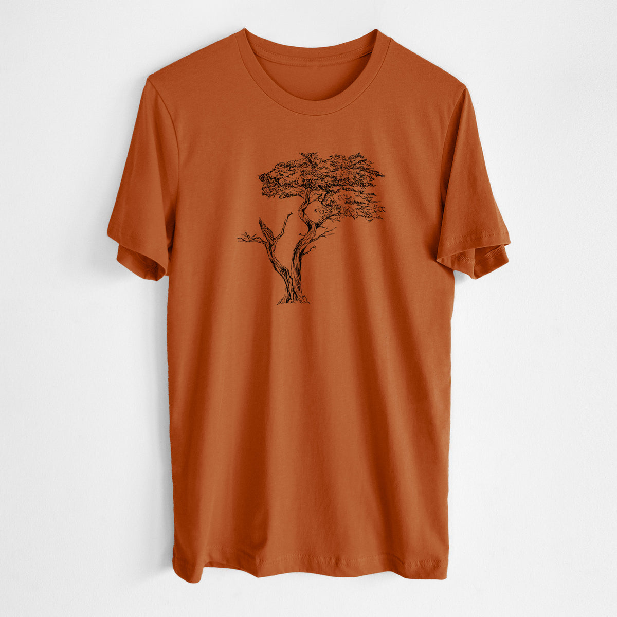 Autumn lightweight cotton t-shirt laid flat, printed with a black ink illustration of the windswept Lone Cypress tree on a rocky outcrop.