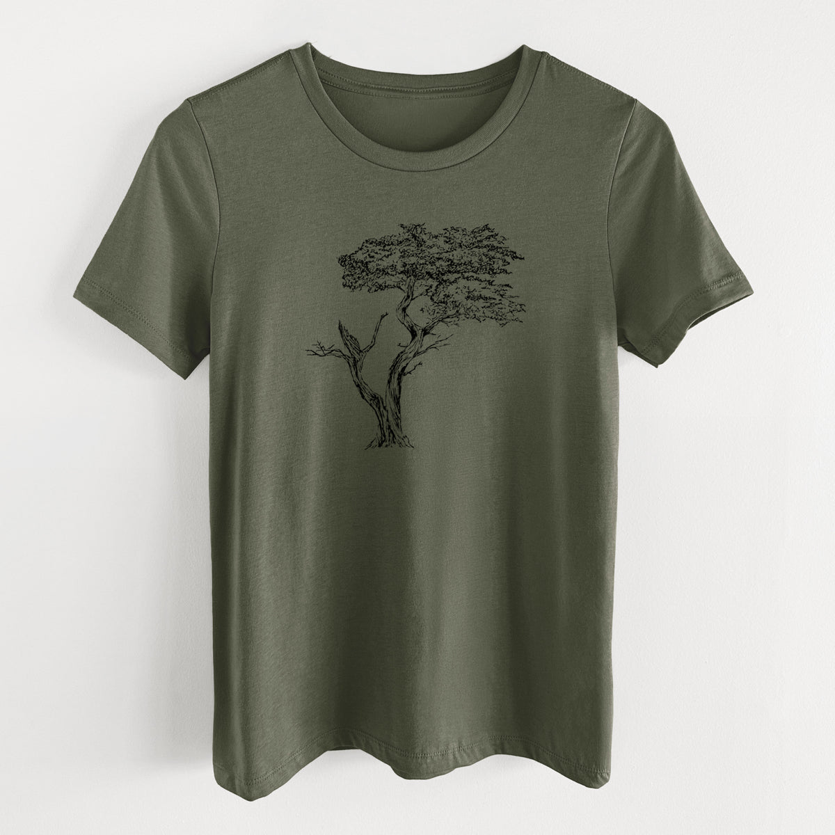Military green women's relaxed fit cotton t-shirt laid flat, printed with a black ink illustration of the windswept Lone Cypress tree on a rocky outcrop.