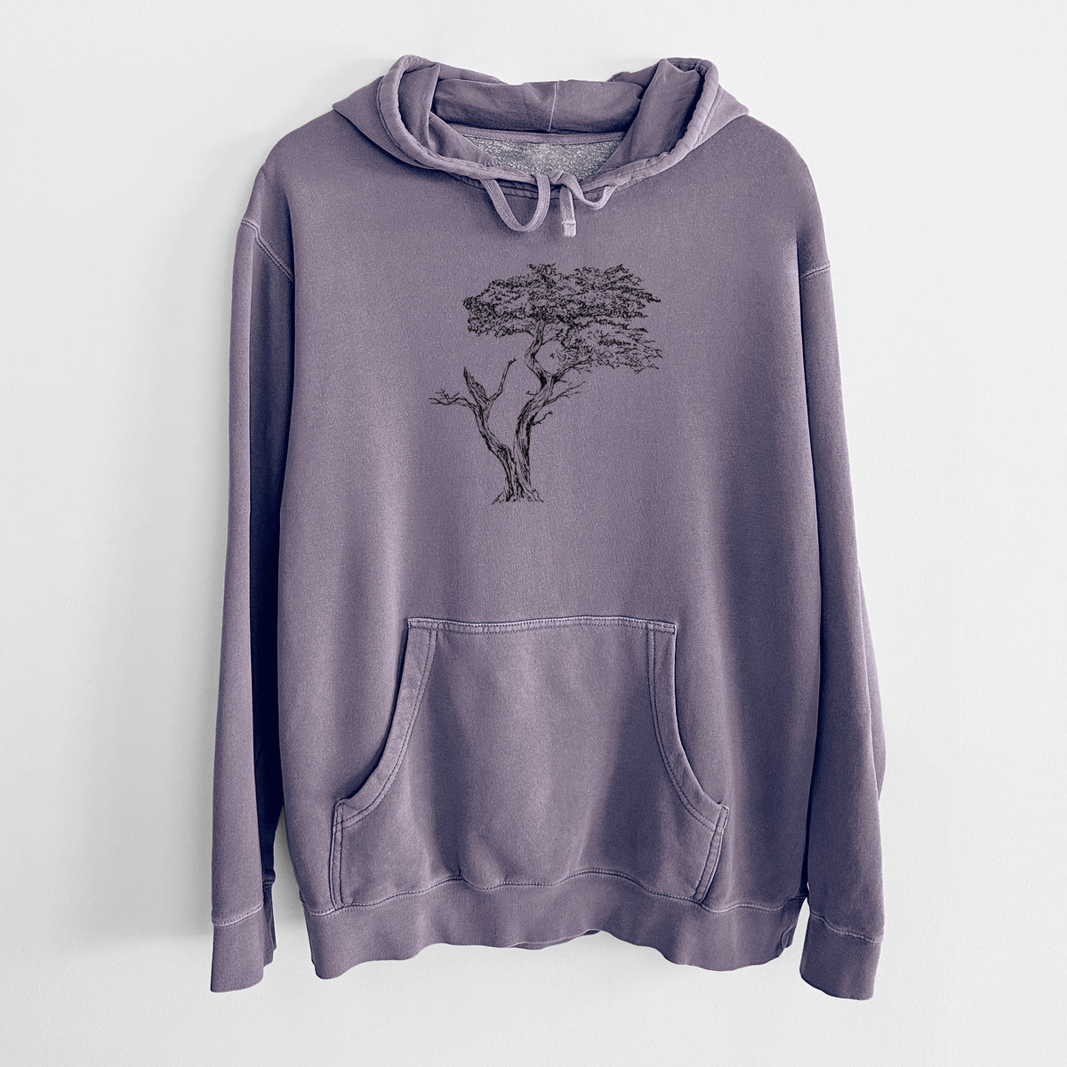 Plum purple pigment dyed hoodie laid flat, printed with a black ink illustration of the windswept Lone Cypress tree on a rocky outcrop.