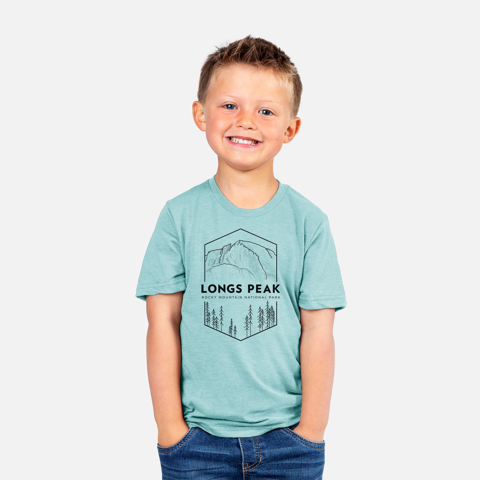 Two youth t-shirts in different colors on hangers, printed with a black line art badge of Longs Peak above a pine forest, with the words Longs Peak, Rocky Mountain National Park.