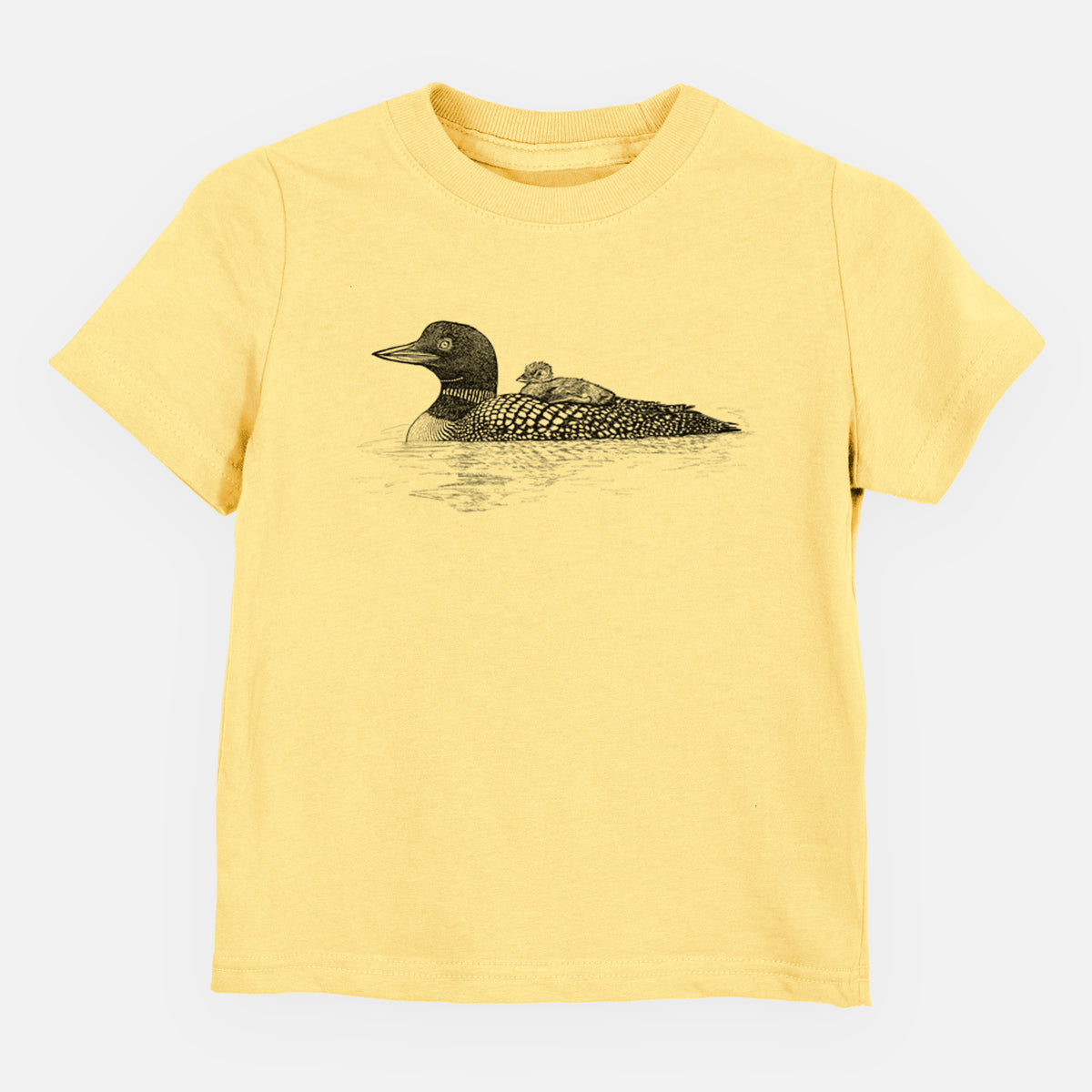Butter yellow toddler t-shirt laid flat, printed with a black ink sketch of a common loon floating on water with a chick riding on its back.