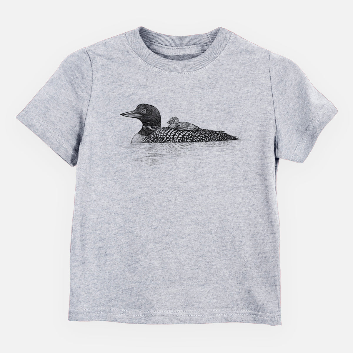 Heather grey toddler t-shirt laid flat, printed with a black ink sketch of a common loon floating on water with a chick riding on its back.