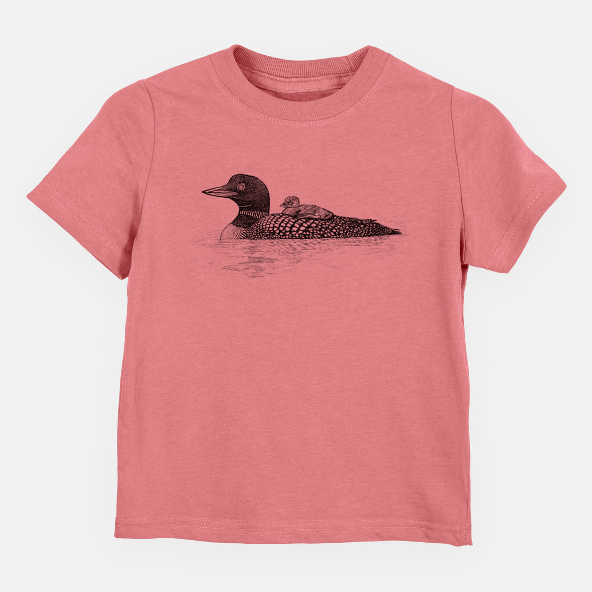 Mauve pink toddler t-shirt laid flat, printed with a black ink sketch of a common loon floating on water with a chick riding on its back.