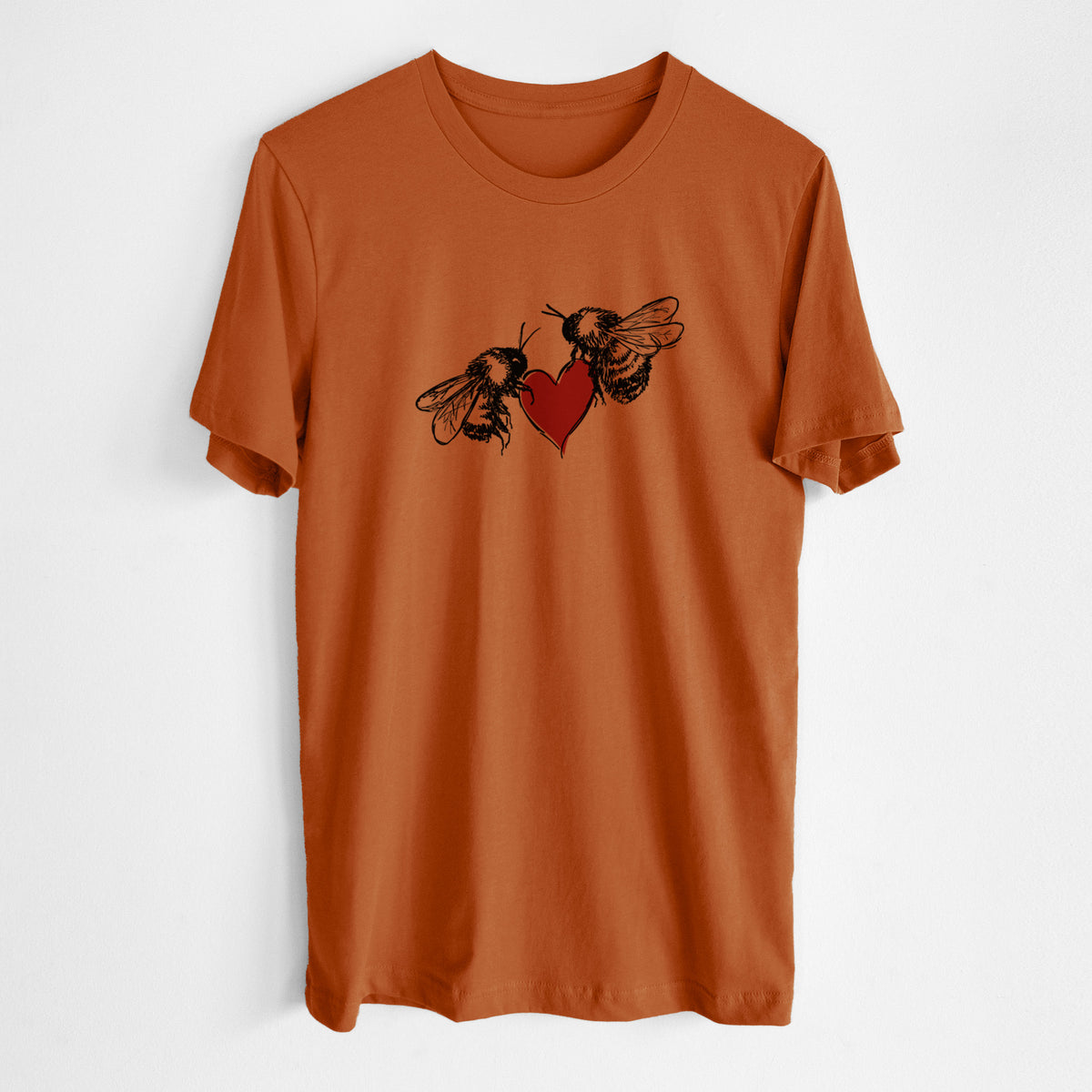 Autumn lightweight cotton t-shirt laid flat, printed with a black ink illustration of two bees facing each other with a red heart between them.