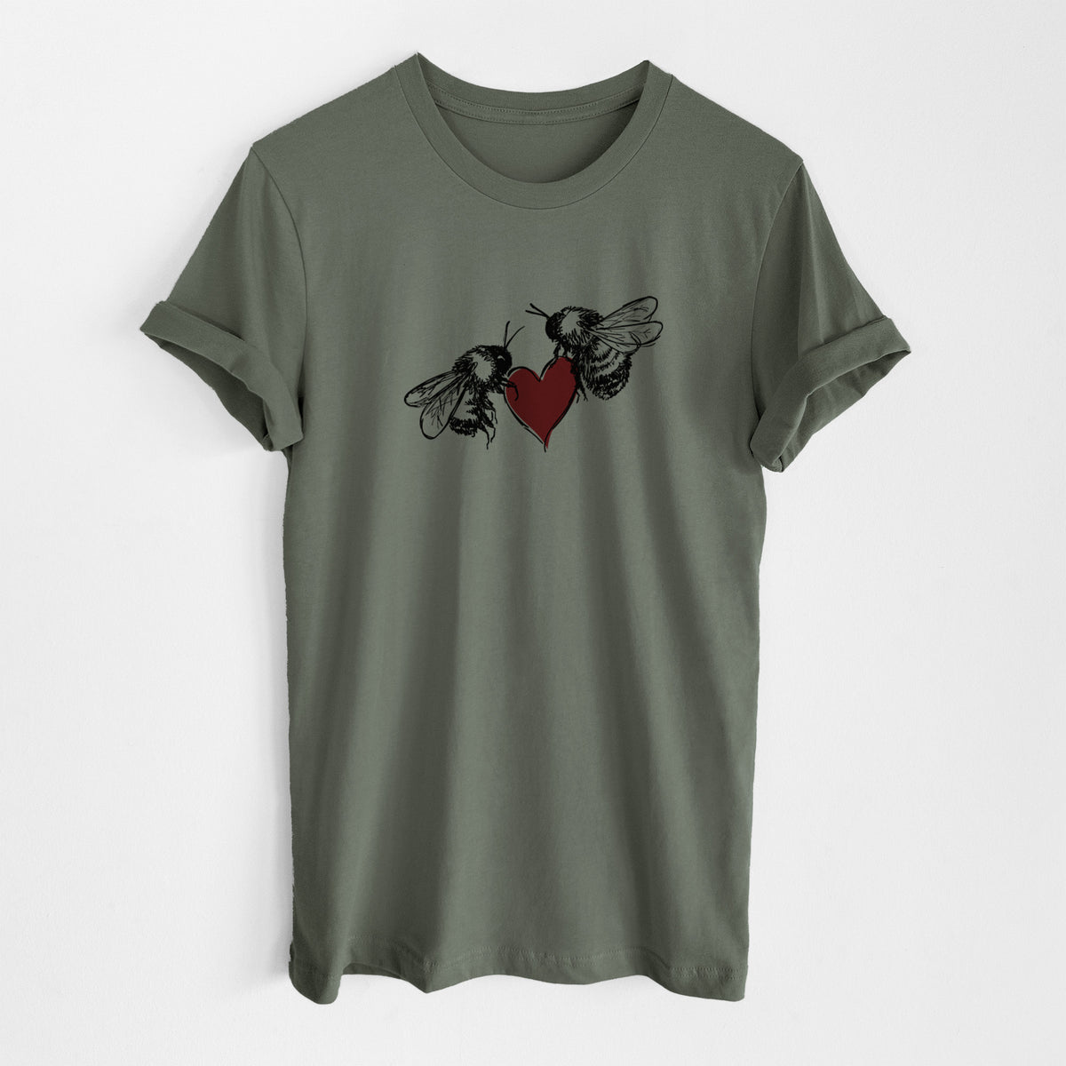 Military green lightweight cotton t-shirt laid flat, printed with a black ink illustration of two bees facing each other with a red heart between them.