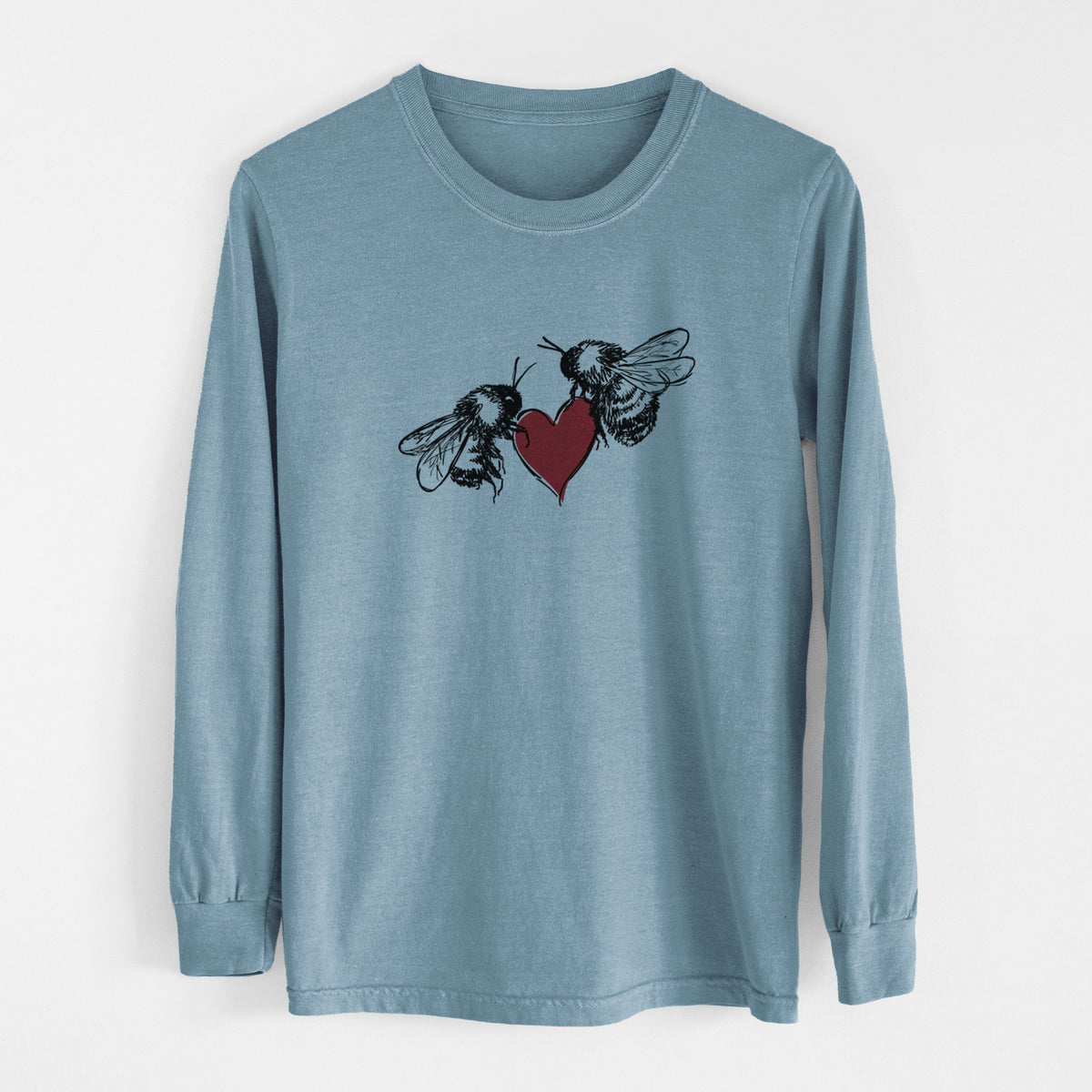 Steel blue Comfort Colors long sleeve shirt laid flat, printed with a black ink illustration of two bees facing each other with a red heart between them.