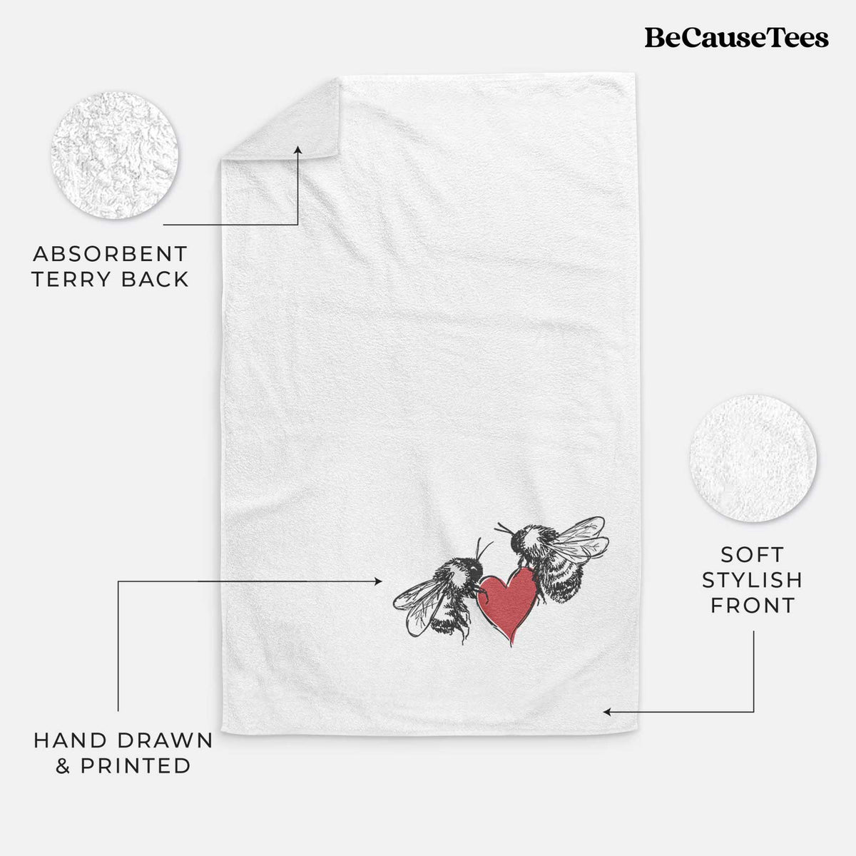 White hand towel printed with a black ink illustration of two bees facing each other with a red heart between them.