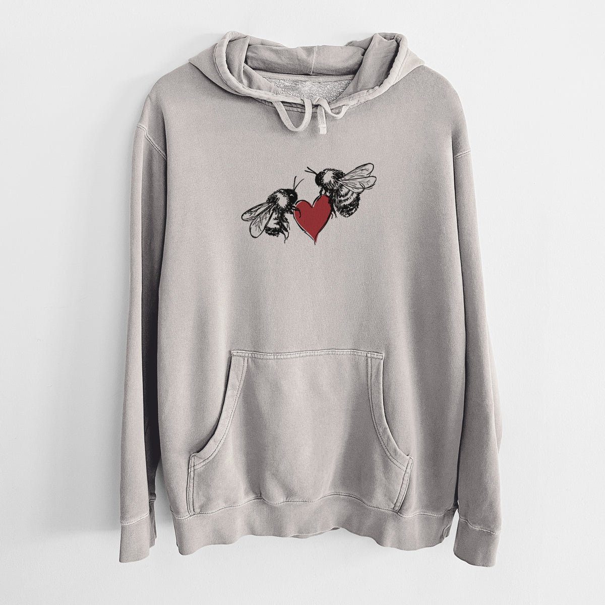 Cement grey pigment dyed hoodie laid flat, printed with a black ink illustration of two bees facing each other with a red heart between them.