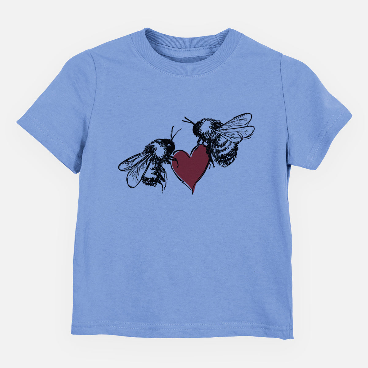 Carolina blue toddler t-shirt laid flat, printed with a black ink illustration of two bees facing each other with a red heart between them.