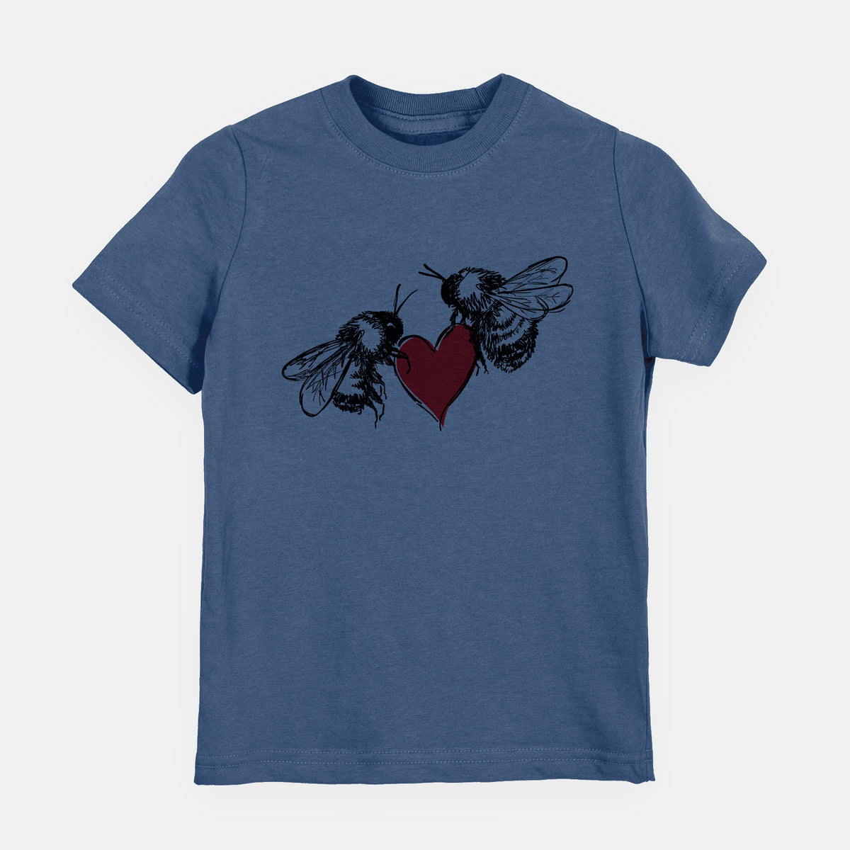 Indigo blue youth t-shirt laid flat, printed with a black ink illustration of two bees facing each other with a red heart between them.