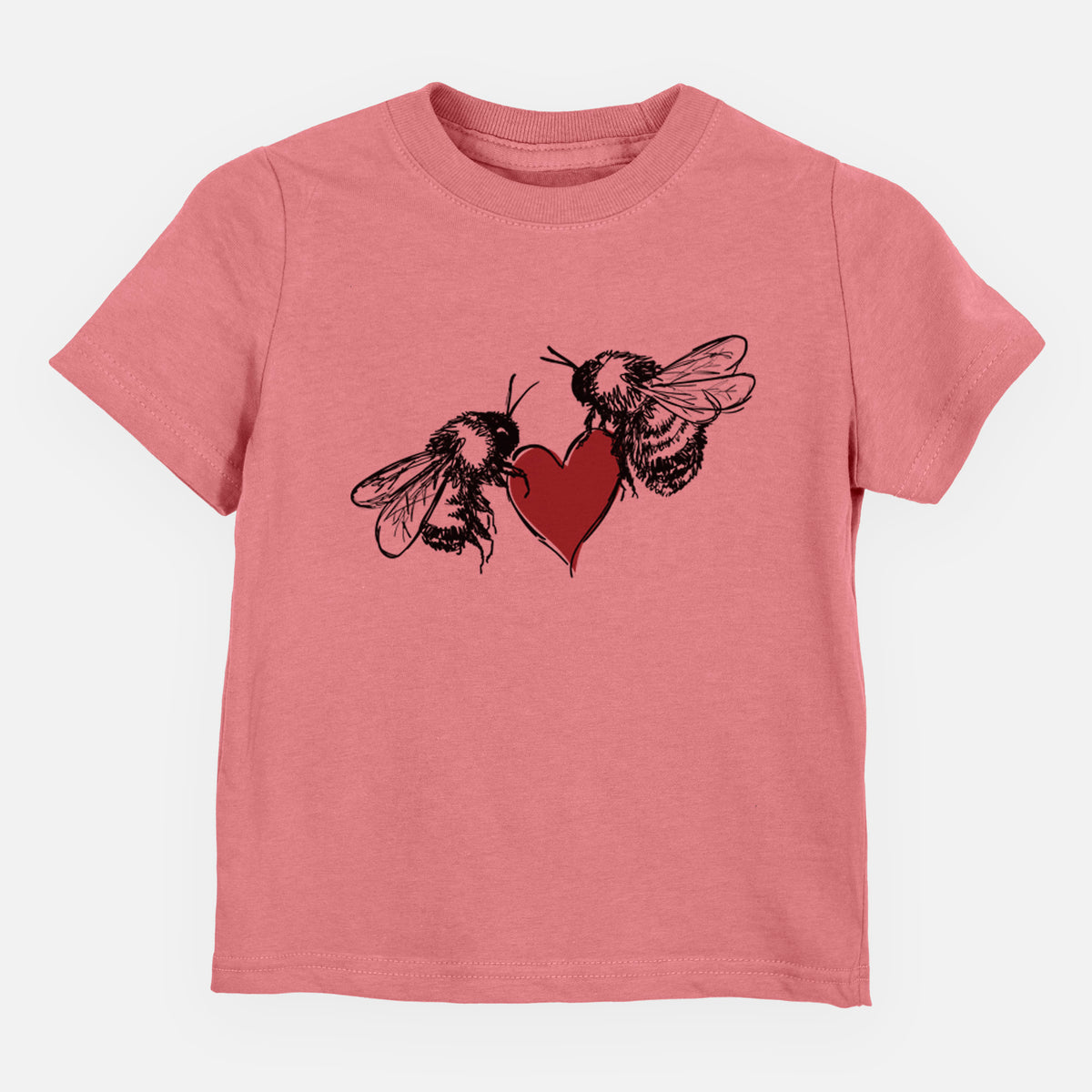 Mauve pink toddler t-shirt laid flat, printed with a black ink illustration of two bees facing each other with a red heart between them.