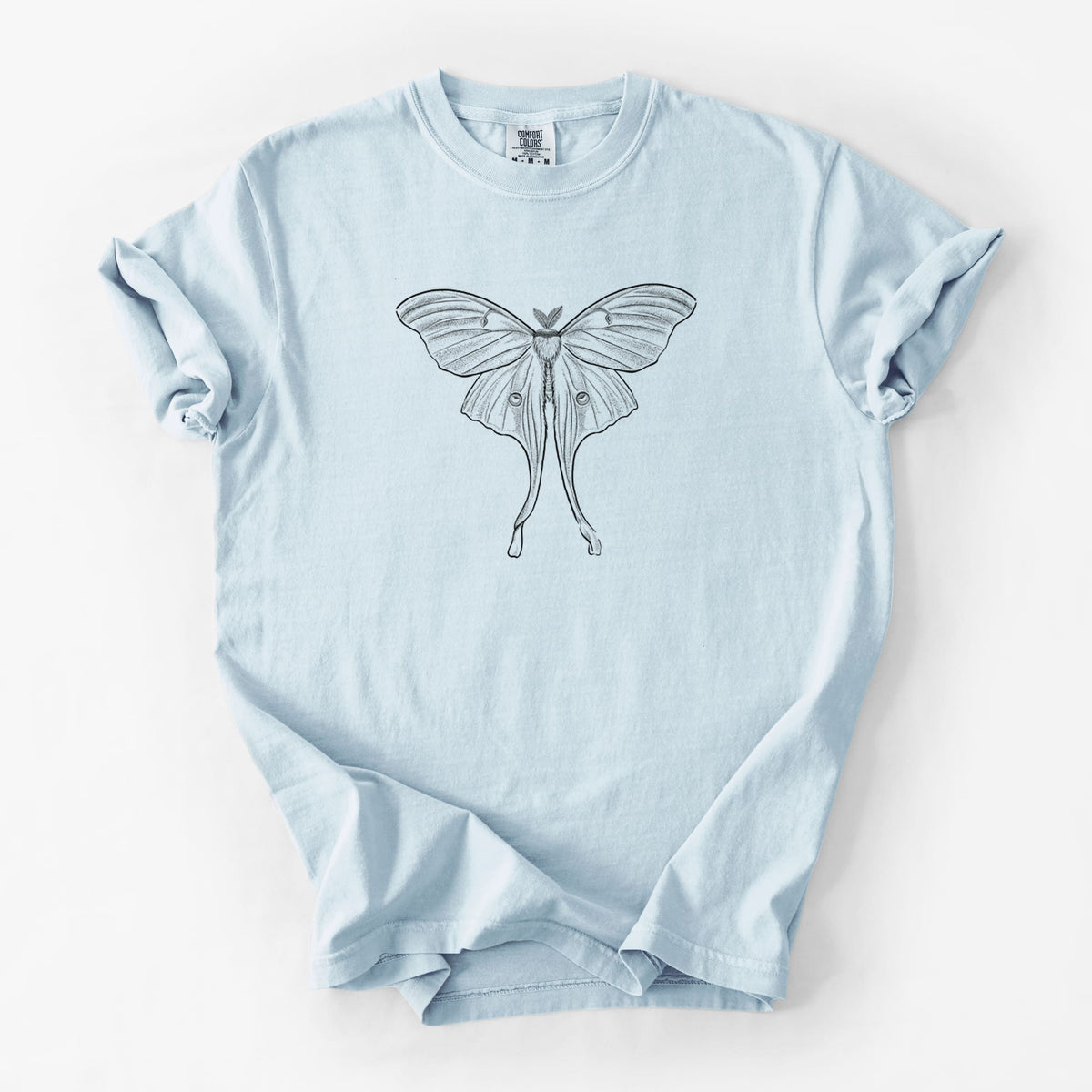 Chambray blue Comfort Colors t-shirt laid flat, printed with a black ink line drawing of a luna moth with long trailing tails on its wings.