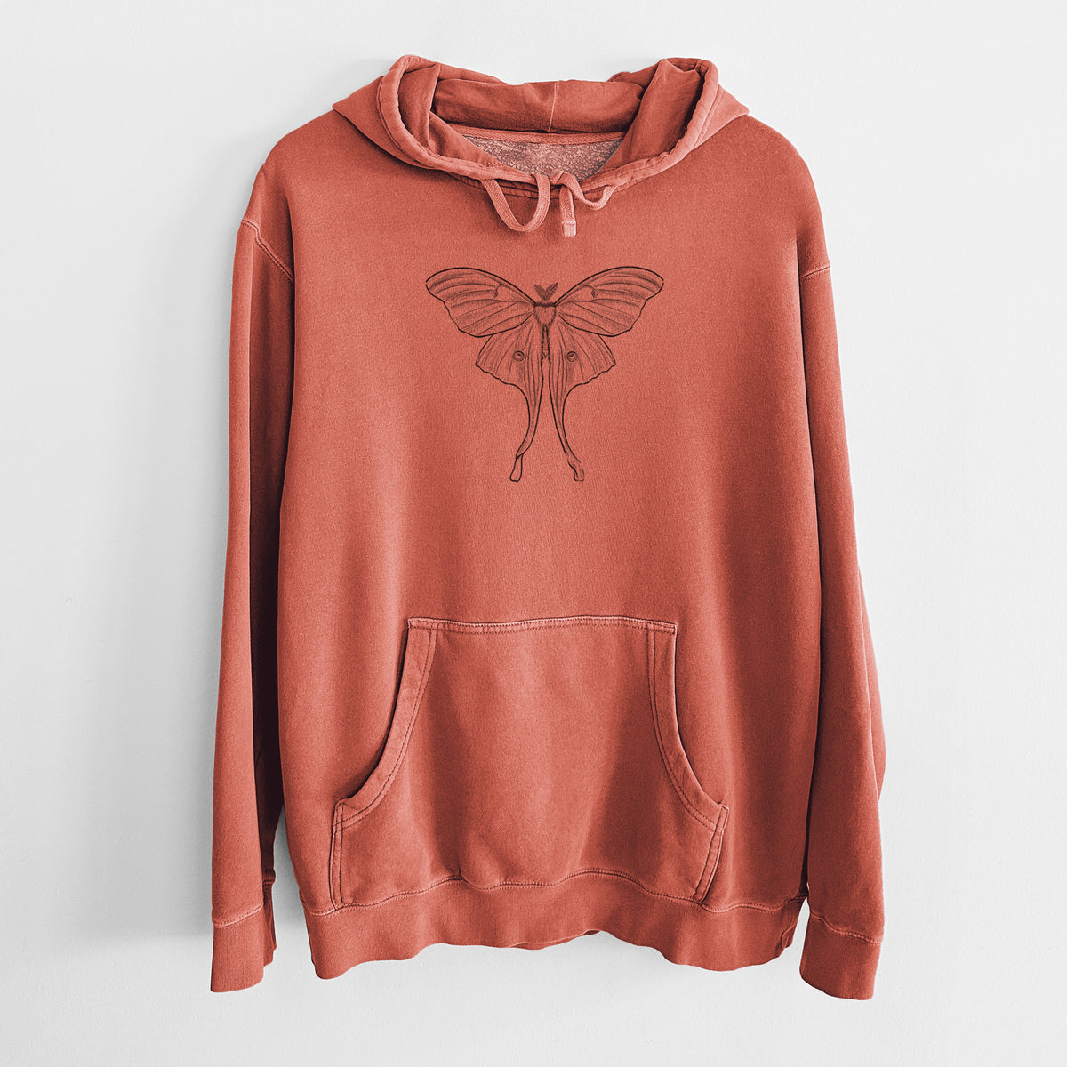 Amber orange pigment dyed hoodie laid flat, printed with a black ink line drawing of a luna moth with long trailing tails on its wings.