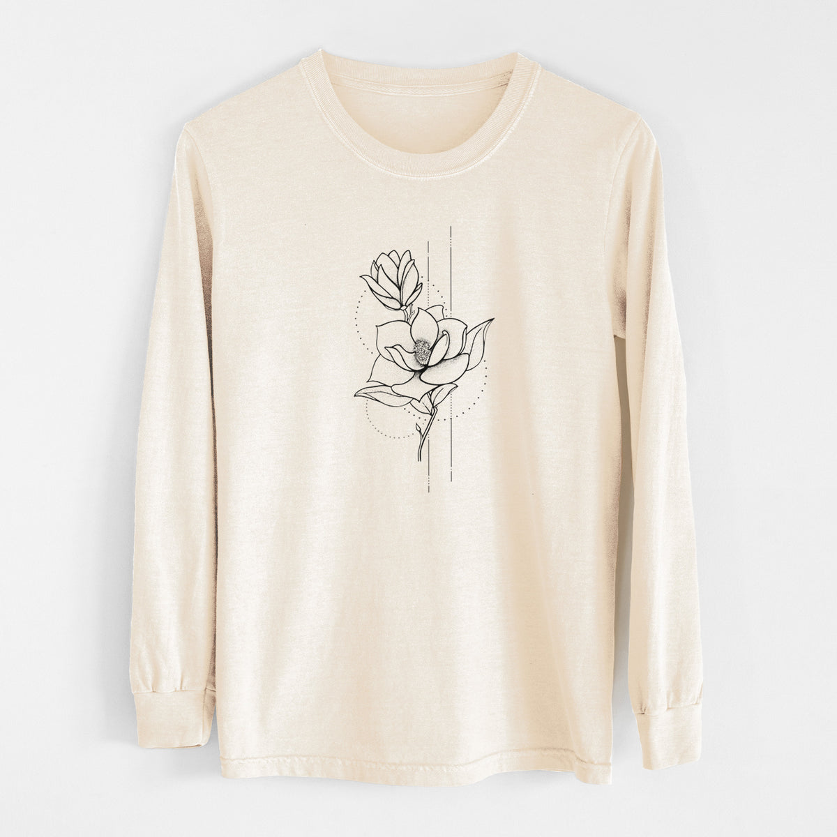 Ivory Comfort Colors long sleeve shirt laid flat, printed with a black ink line drawing of a magnolia blossom on a stem.