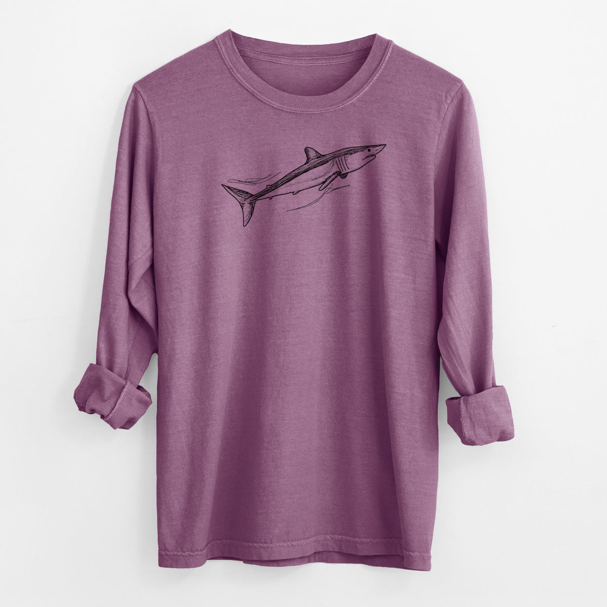 Berry pink Comfort Colors long sleeve shirt laid flat with the cuffs rolled, printed with a black ink illustration of a mako shark swimming.