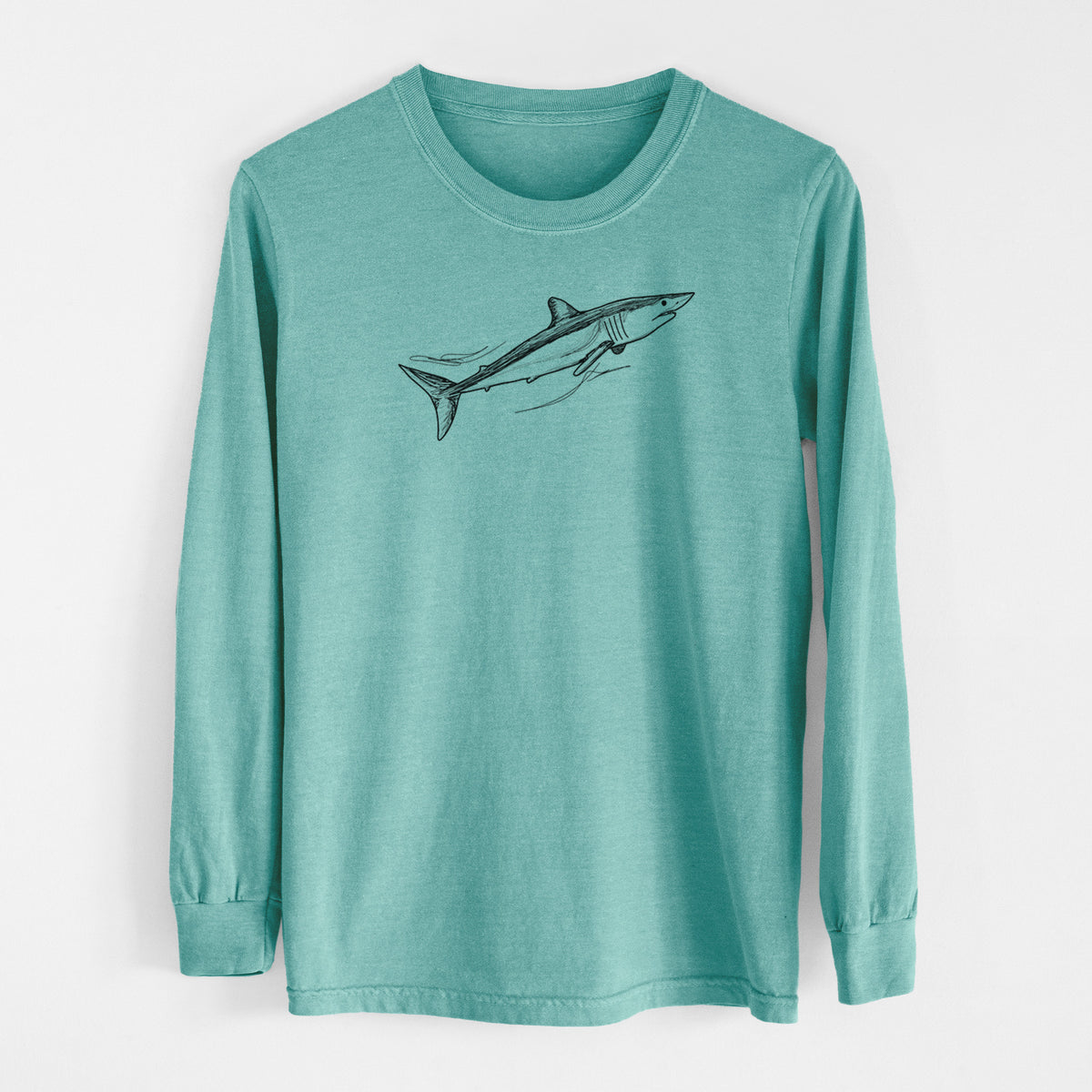 Reef green Comfort Colors long sleeve shirt laid flat, printed with a black ink illustration of a mako shark swimming.