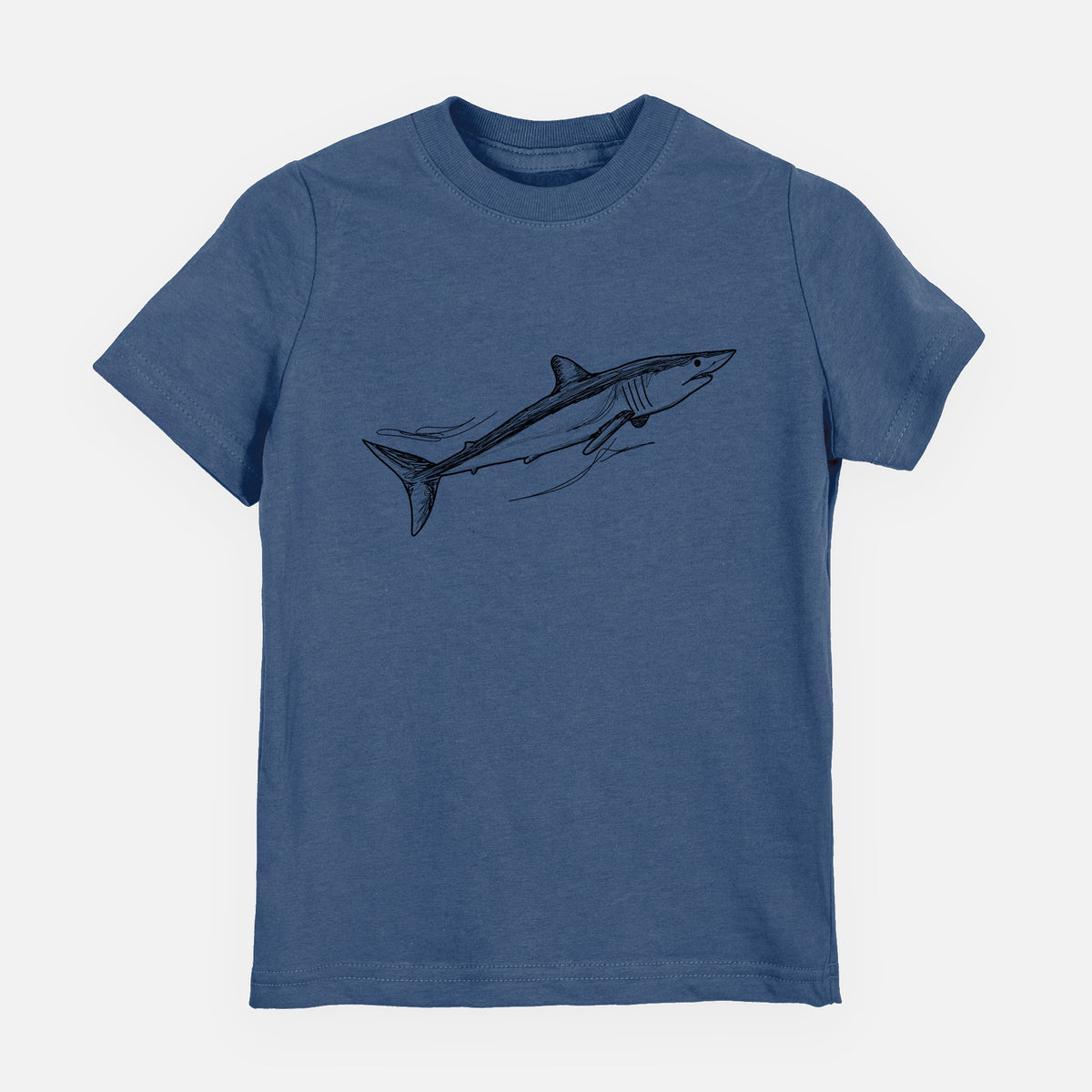 Indigo blue youth t-shirt laid flat, printed with a black ink illustration of a mako shark swimming.