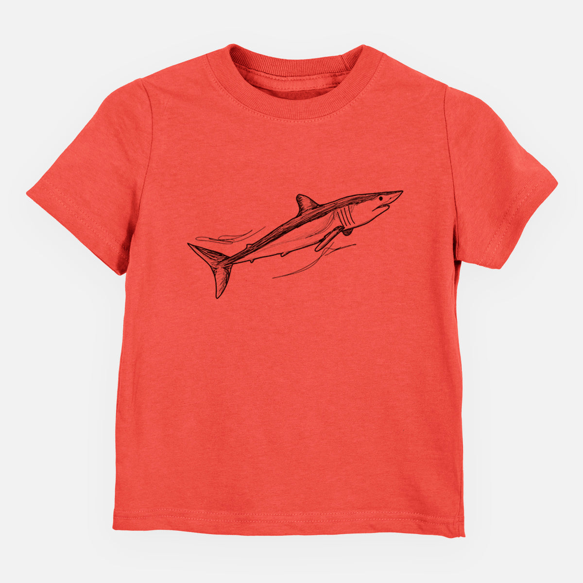 Passionfruit pink toddler t-shirt laid flat, printed with a black ink illustration of a mako shark swimming.