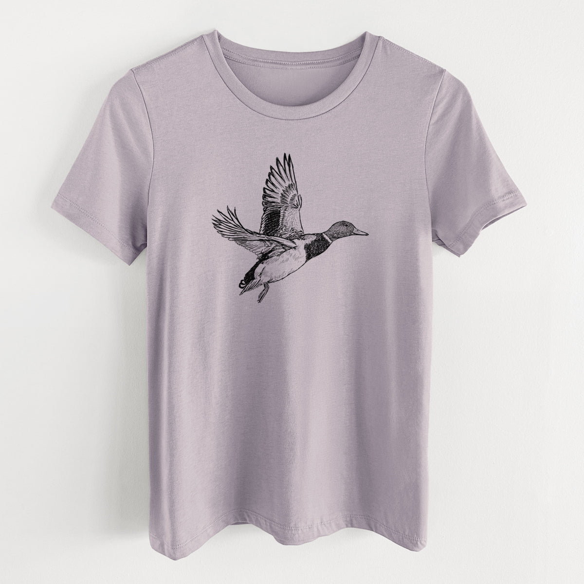 Light violet women's relaxed fit cotton t-shirt laid flat, printed with a detailed black ink illustration of a male mallard duck taking flight.