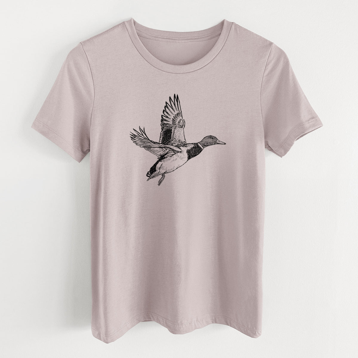 Pink gravel women's relaxed fit cotton t-shirt laid flat, printed with a detailed black ink illustration of a male mallard duck taking flight.