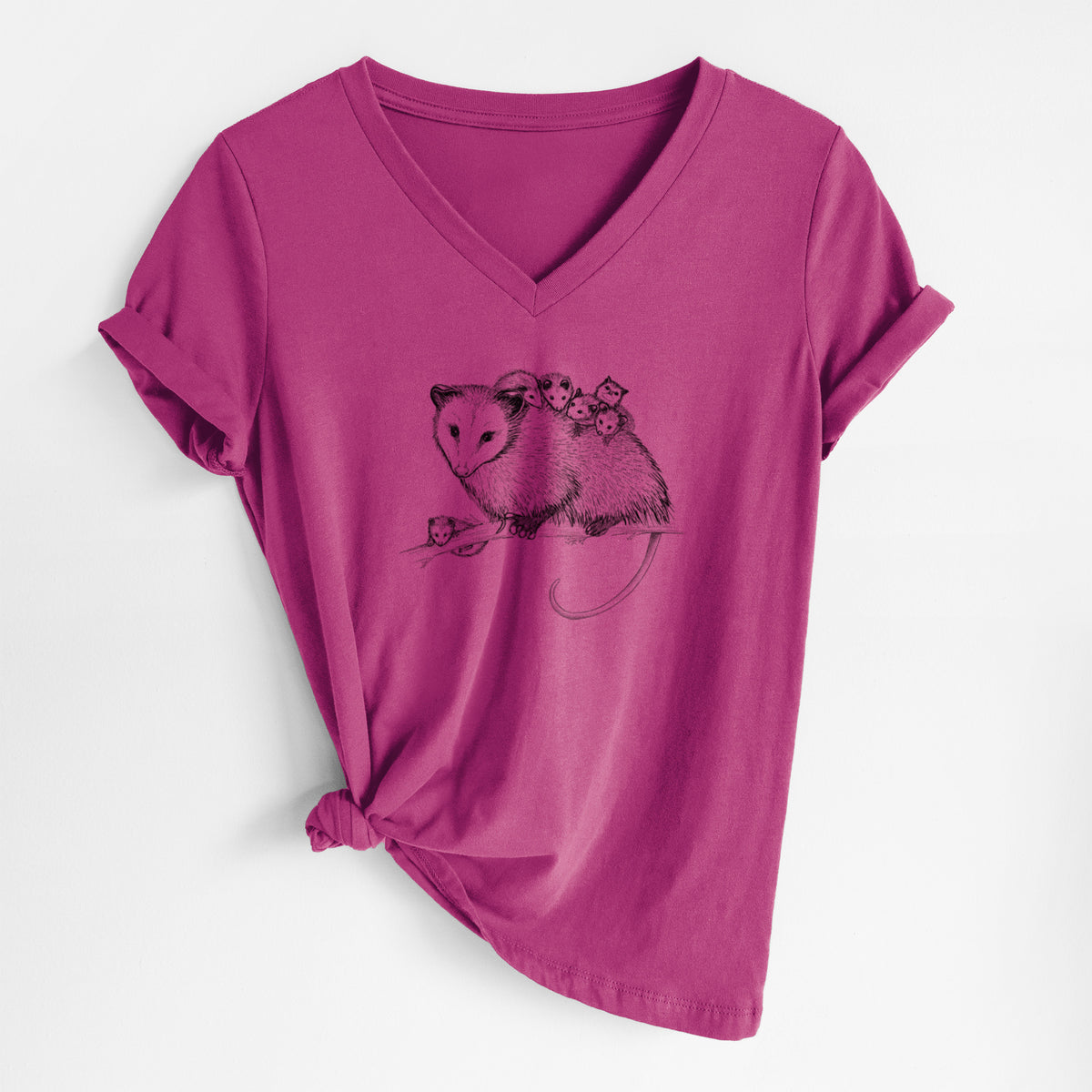 Berry pink women's relaxed fit cotton V-neck t-shirt laid flat, printed with a black ink illustration of a mother opossum on a branch carrying her babies on her back.