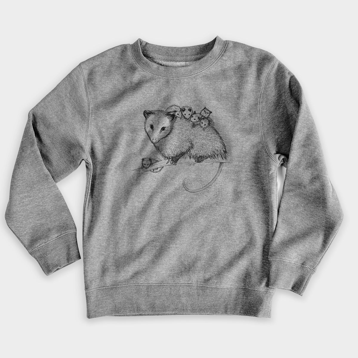 Nickel grey youth crewneck sweatshirt laid flat, printed with a black ink illustration of a mother opossum on a branch carrying her babies on her back.