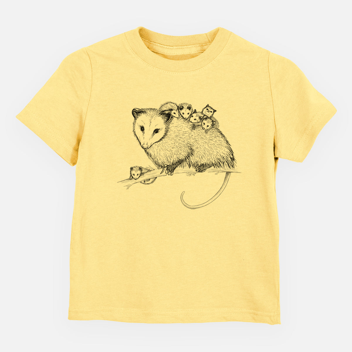 Butter yellow toddler t-shirt laid flat, printed with a black ink illustration of a mother opossum on a branch carrying her babies on her back.