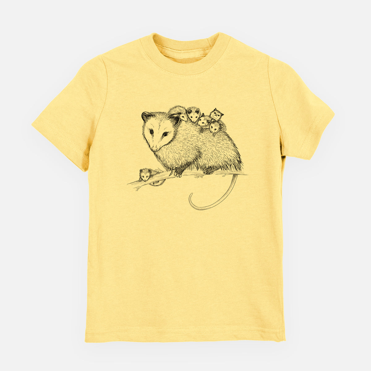 Butter yellow youth t-shirt laid flat, printed with a black ink illustration of a mother opossum on a branch carrying her babies on her back.