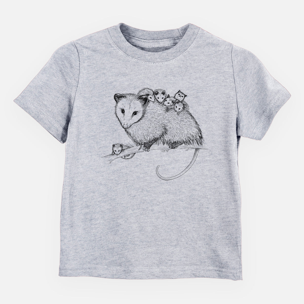 Heather grey toddler t-shirt laid flat, printed with a black ink illustration of a mother opossum on a branch carrying her babies on her back.