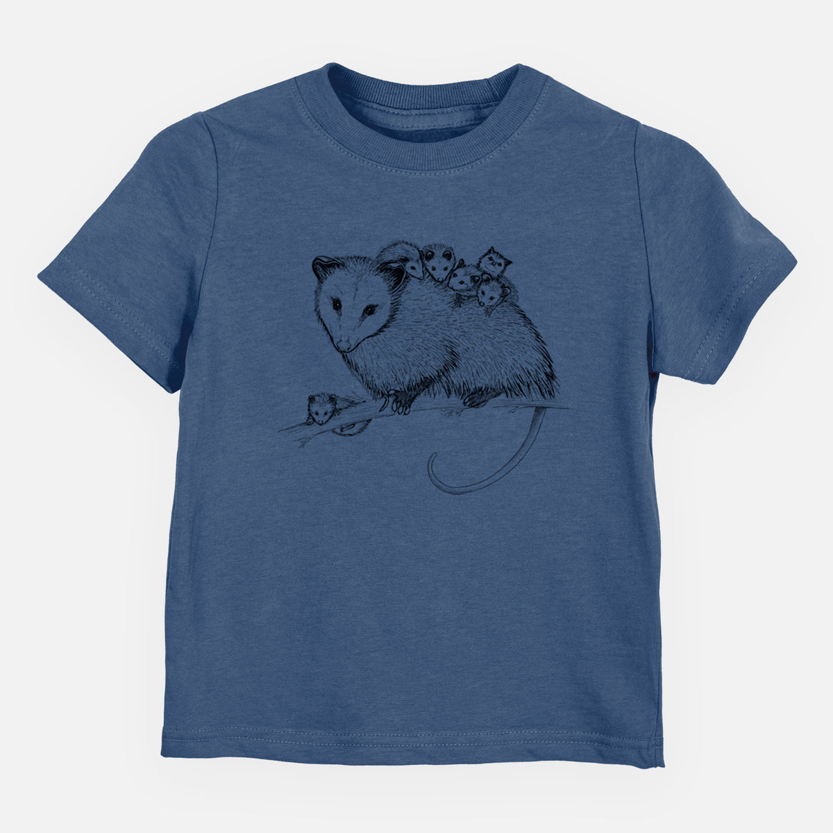 Indigo blue toddler t-shirt laid flat, printed with a black ink illustration of a mother opossum on a branch carrying her babies on her back.