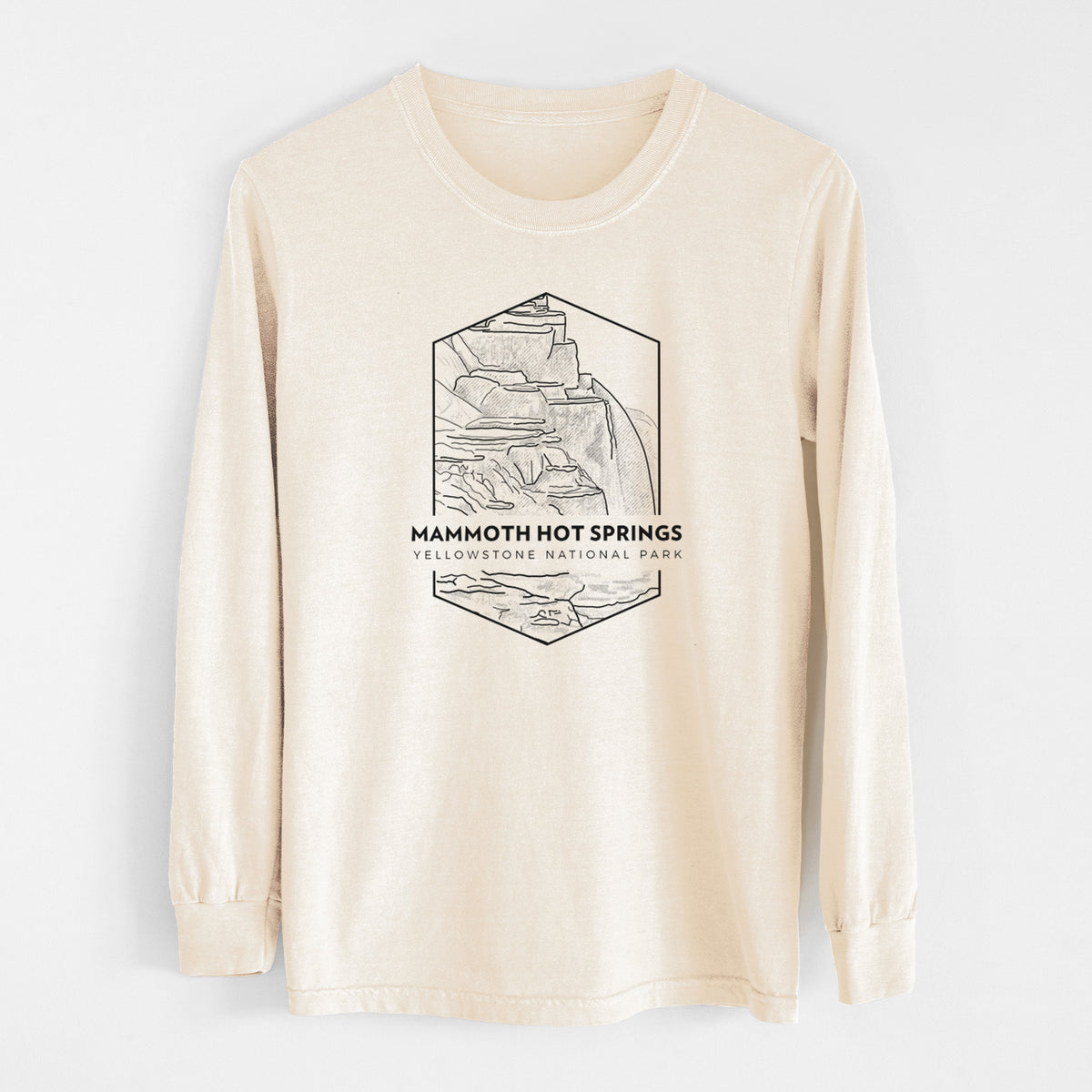 Ivory Comfort Colors long sleeve shirt laid flat, printed with a black line art badge of the terraces at Mammoth Hot Springs, with the words Mammoth Hot Springs, Yellowstone National Park.