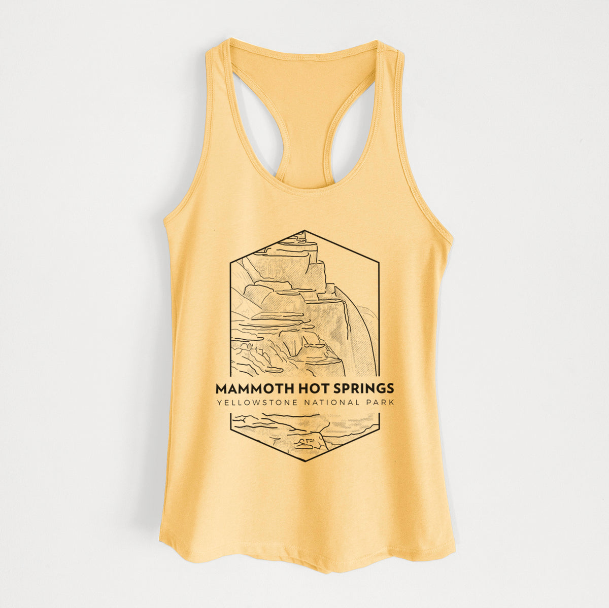 Banana cream women's racerback tank top laid flat, printed with a black line art badge of the terraces at Mammoth Hot Springs, with the words Mammoth Hot Springs, Yellowstone National Park.