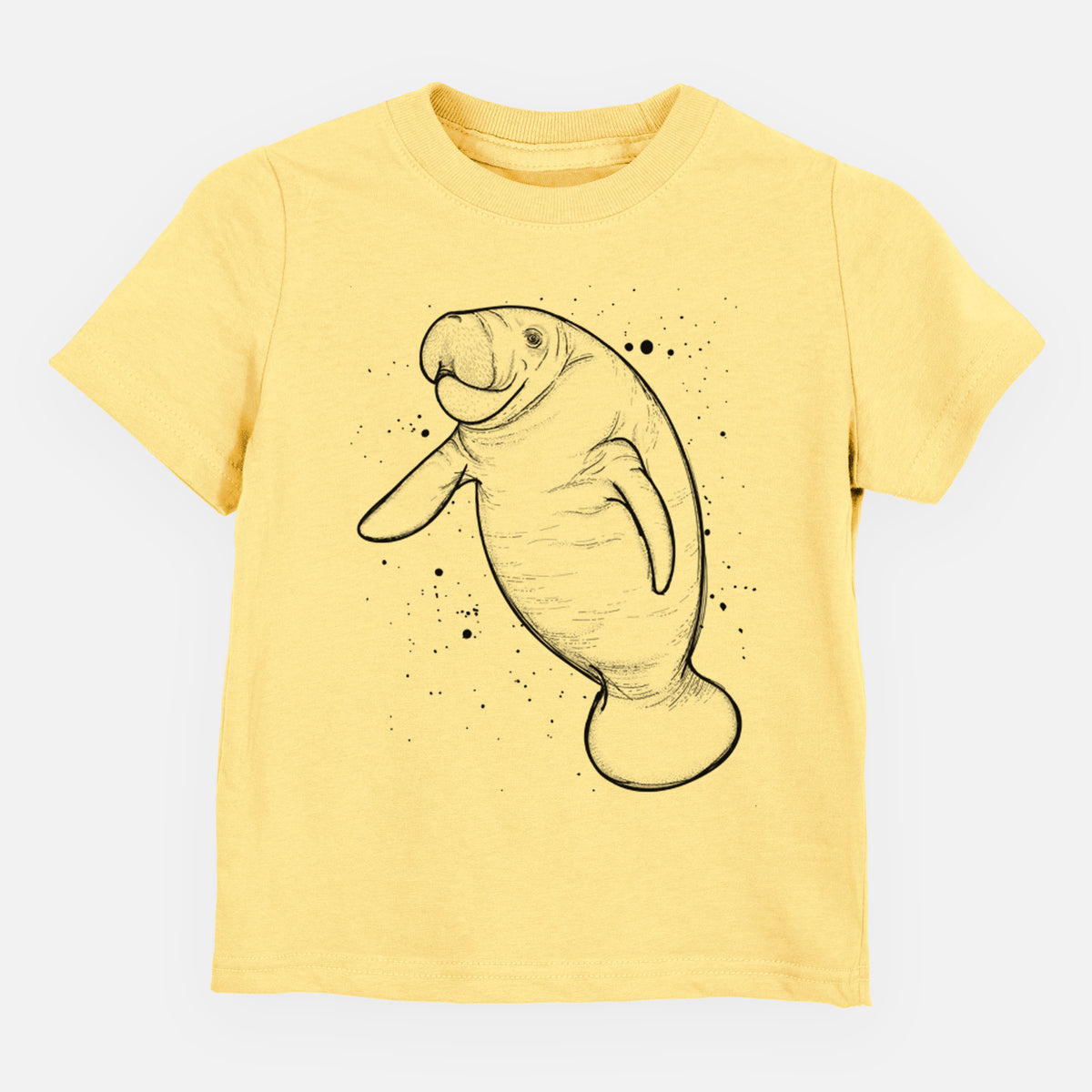 Butter yellow toddler t-shirt laid flat, printed with a black ink line drawing of a manatee swimming, with ink splatters.