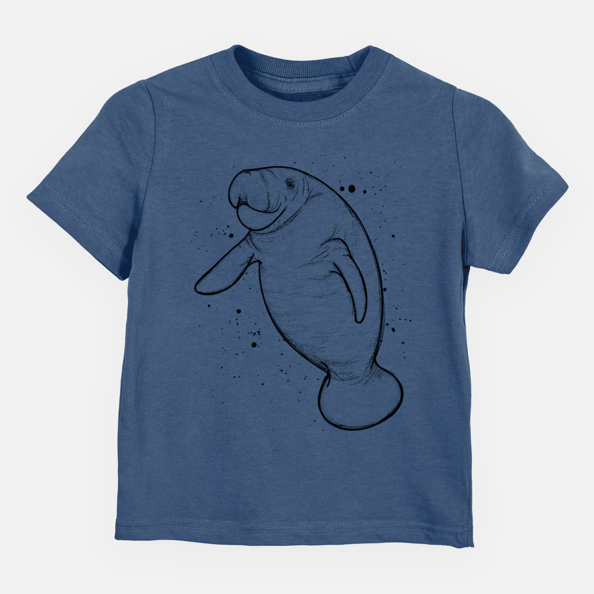 Indigo blue toddler t-shirt laid flat, printed with a black ink line drawing of a manatee swimming, with ink splatters.