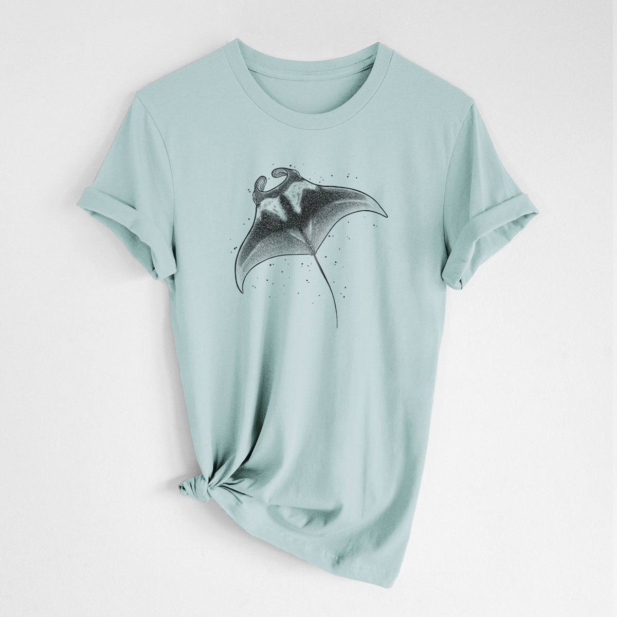 Dusty blue lightweight cotton t-shirt laid flat with the sleeves rolled, printed with a black ink illustration of a manta ray gliding.