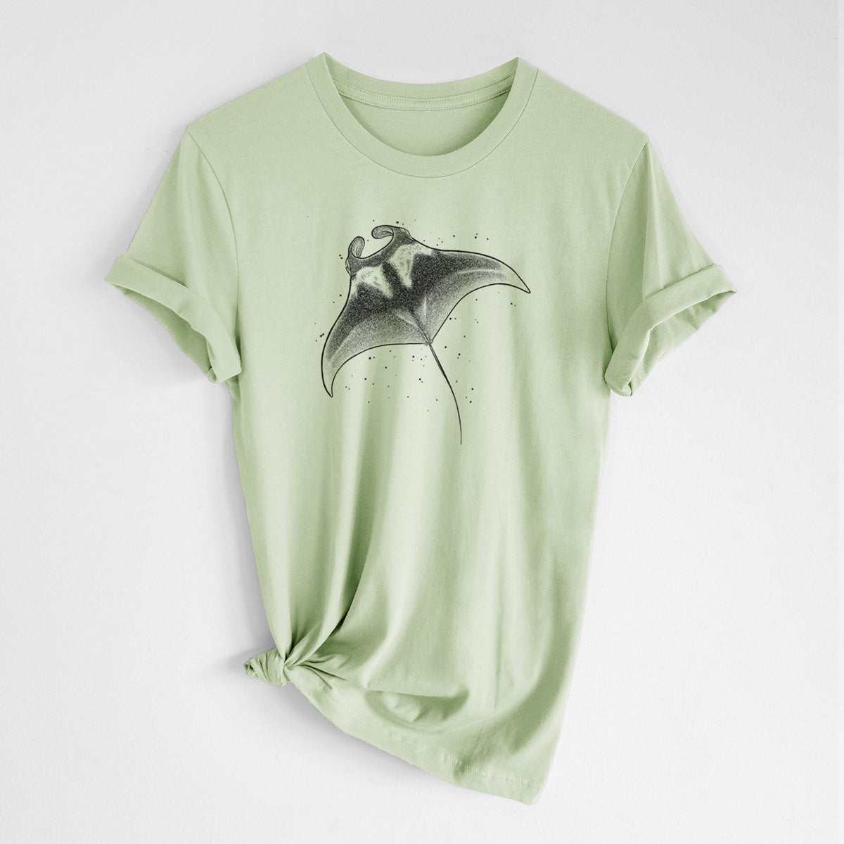 Spring green lightweight cotton t-shirt laid flat with the sleeves rolled, printed with a black ink illustration of a manta ray gliding.