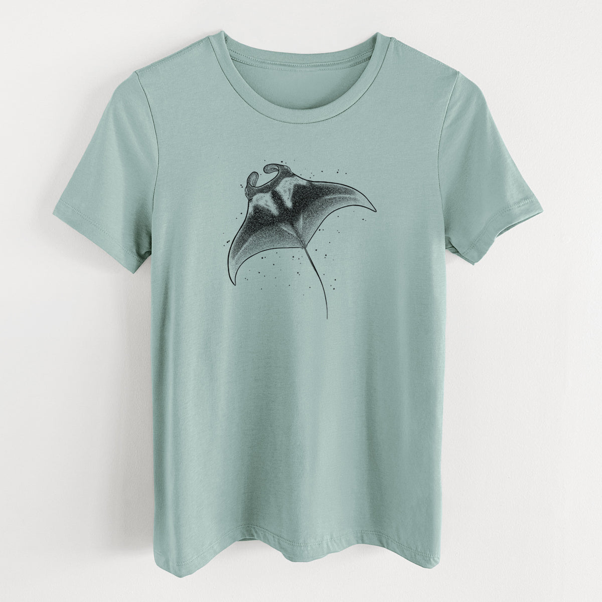 Dusty blue women's relaxed fit cotton t-shirt laid flat, printed with a black ink illustration of a manta ray gliding.