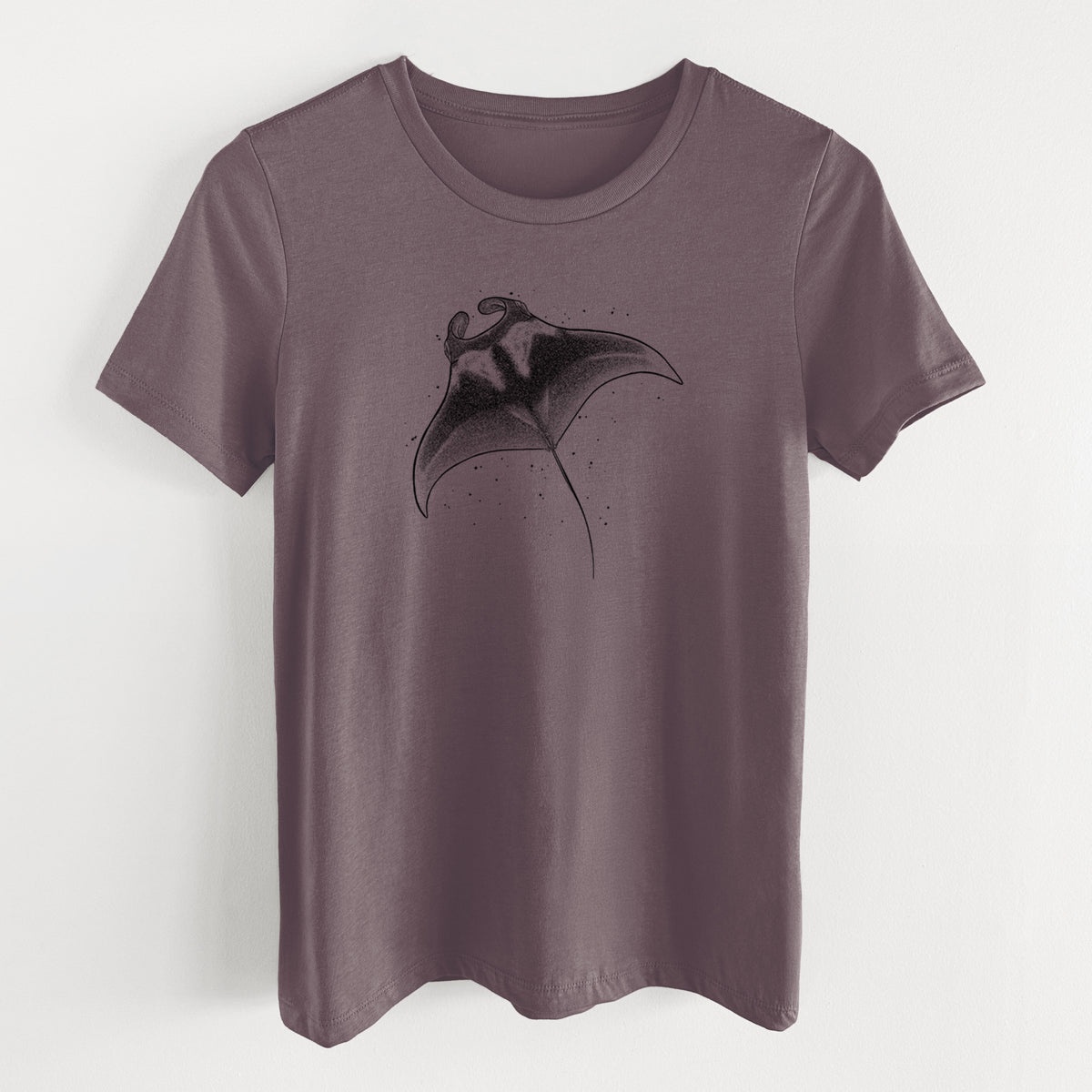 Purple storm women's relaxed fit cotton t-shirt laid flat, printed with a black ink illustration of a manta ray gliding.