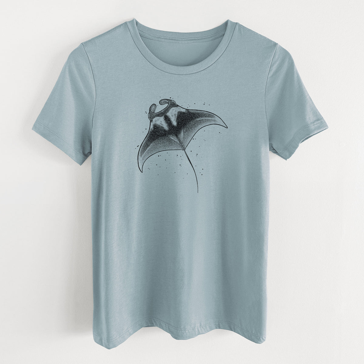 Vintage denim women's relaxed fit cotton t-shirt laid flat, printed with a black ink illustration of a manta ray gliding.
