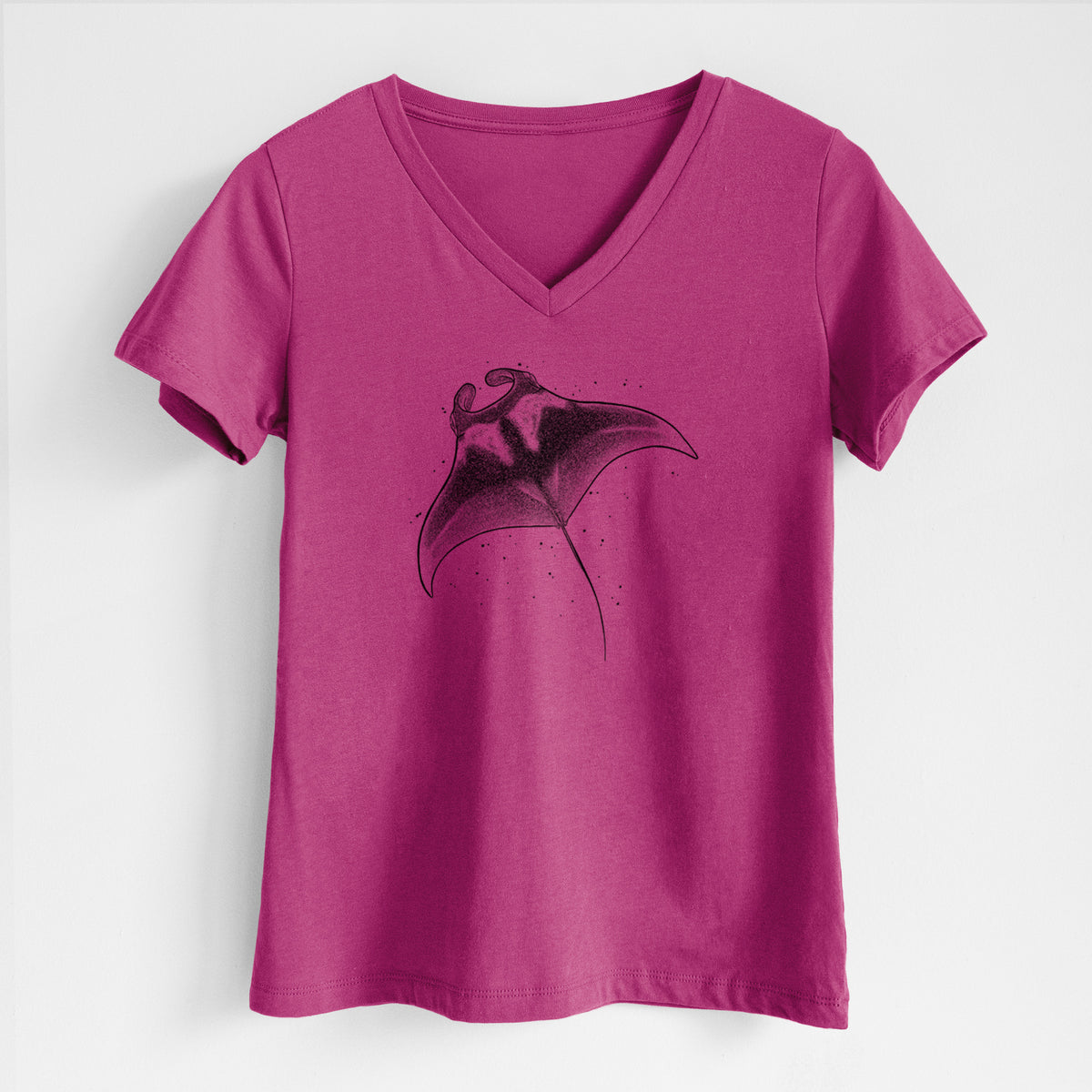 Berry pink women's relaxed fit cotton V-neck t-shirt laid flat, printed with a black ink illustration of a manta ray gliding.
