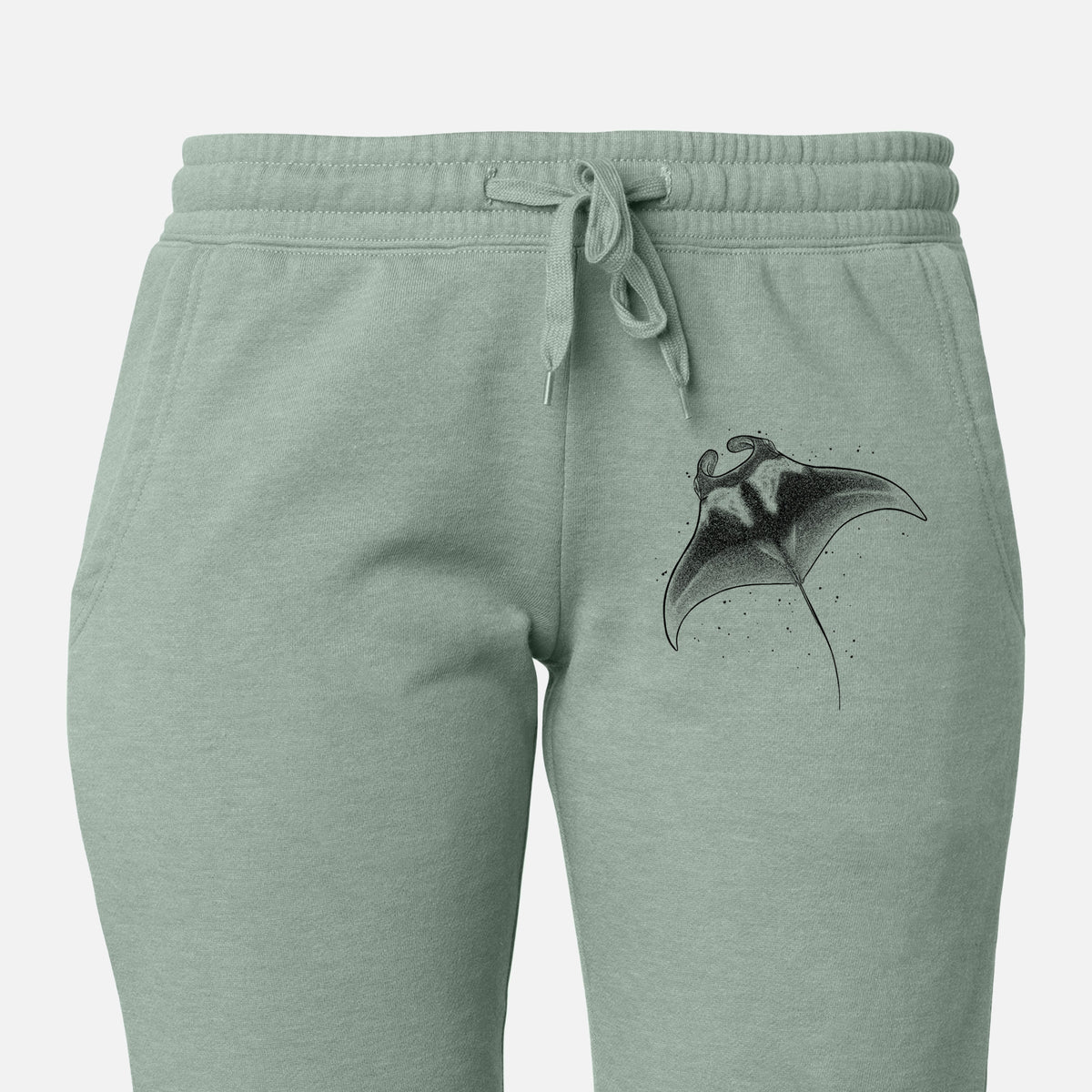 Front of sage green Cali Wave sweatpants, printed with a black ink illustration of a manta ray gliding on the leg.