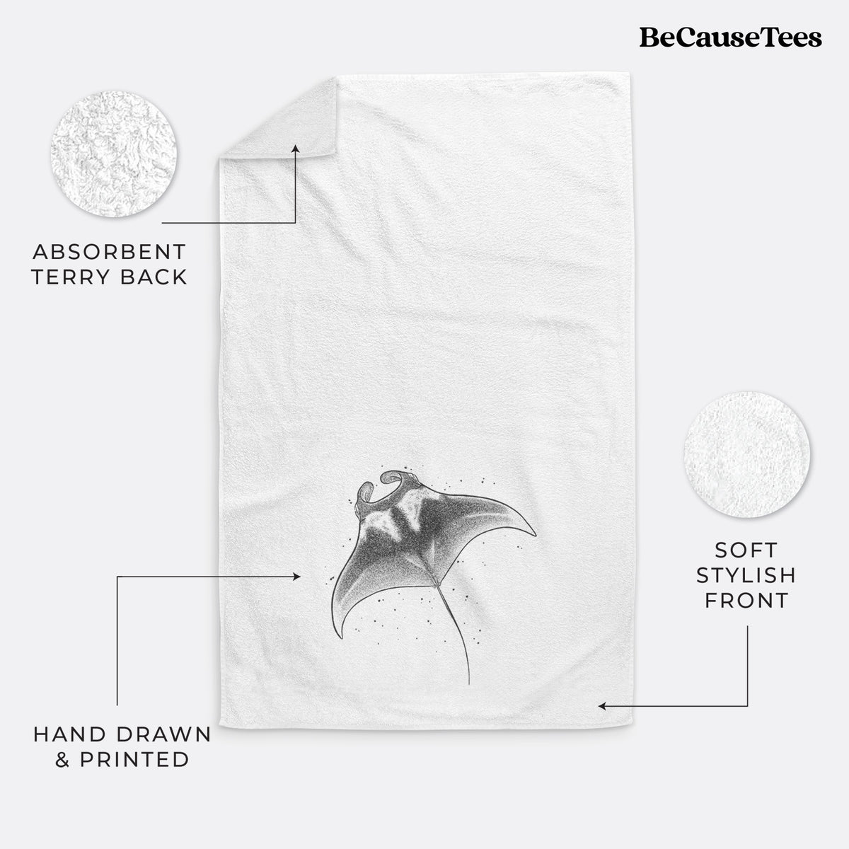 White hand towel printed with a black ink illustration of a manta ray gliding.