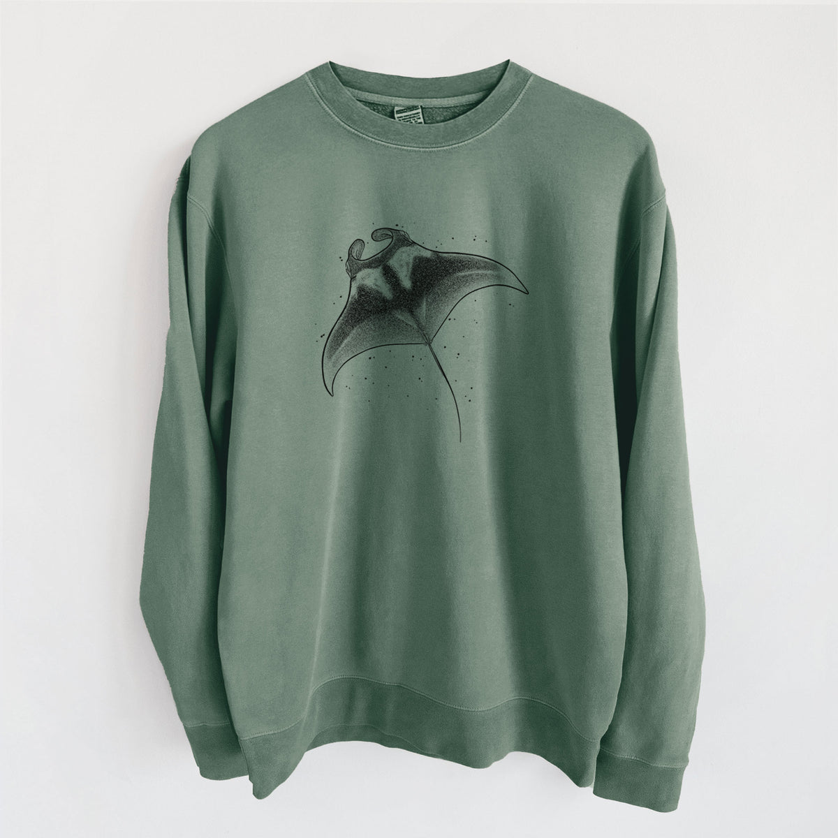 Alpine green pigment dyed crewneck sweatshirt laid flat, printed with a black ink illustration of a manta ray gliding.