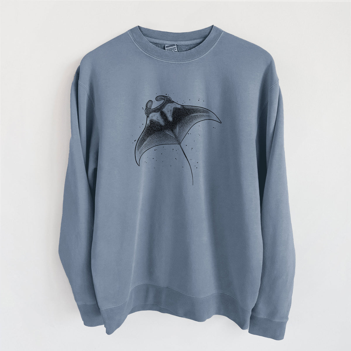 Slate blue pigment dyed crewneck sweatshirt laid flat, printed with a black ink illustration of a manta ray gliding.