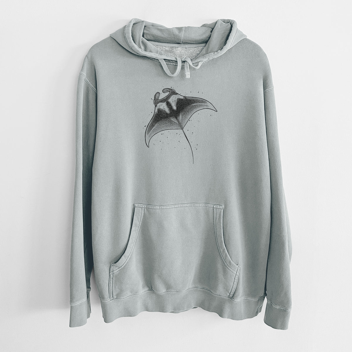 Sage green pigment dyed hoodie laid flat, printed with a black ink illustration of a manta ray gliding.
