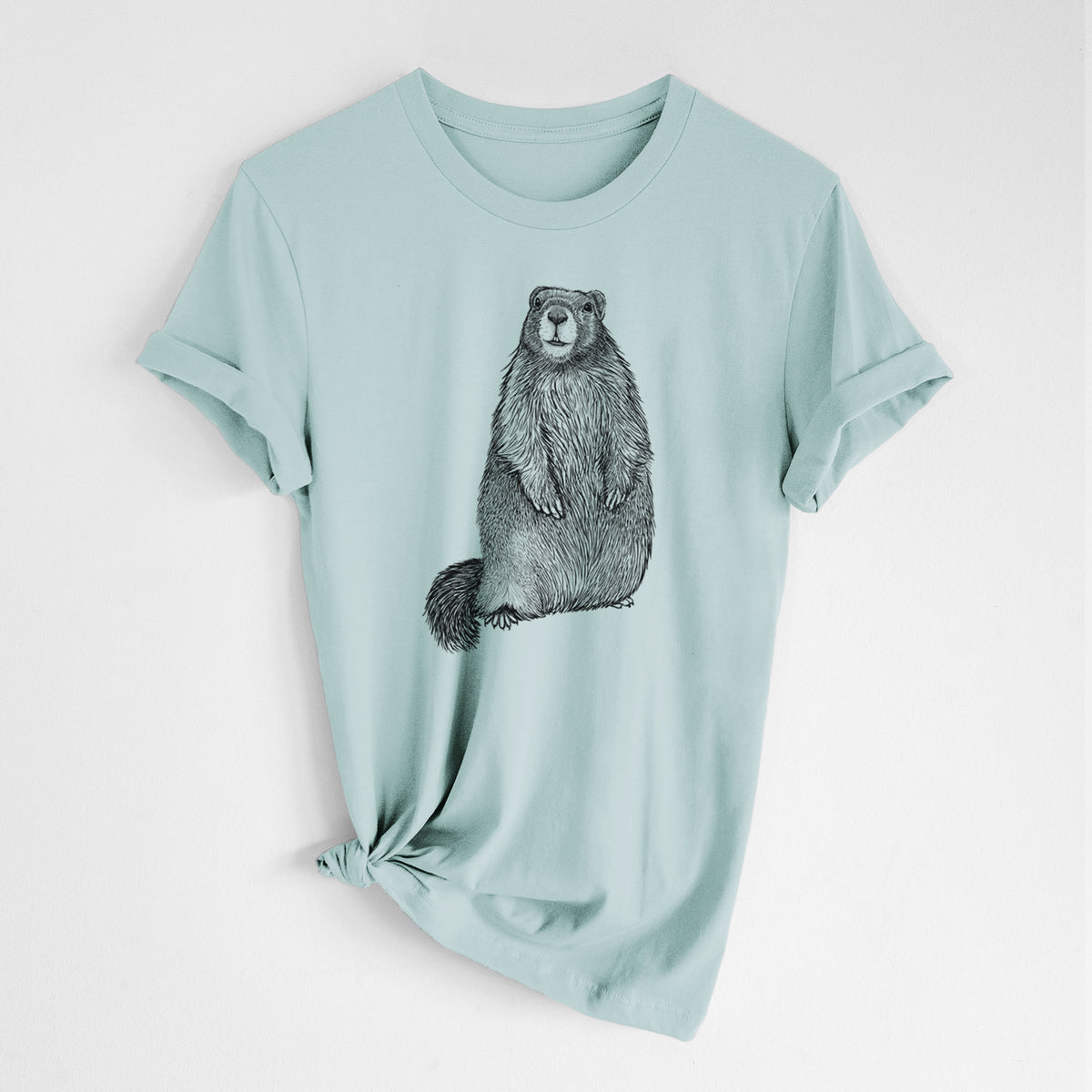 Dusty blue lightweight cotton t-shirt laid flat with the sleeves rolled, printed with a detailed black ink illustration of a marmot standing upright.