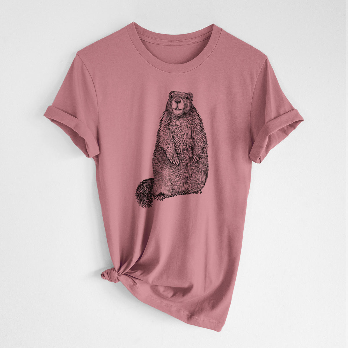 Mauve pink lightweight cotton t-shirt laid flat with the sleeves rolled, printed with a detailed black ink illustration of a marmot standing upright.