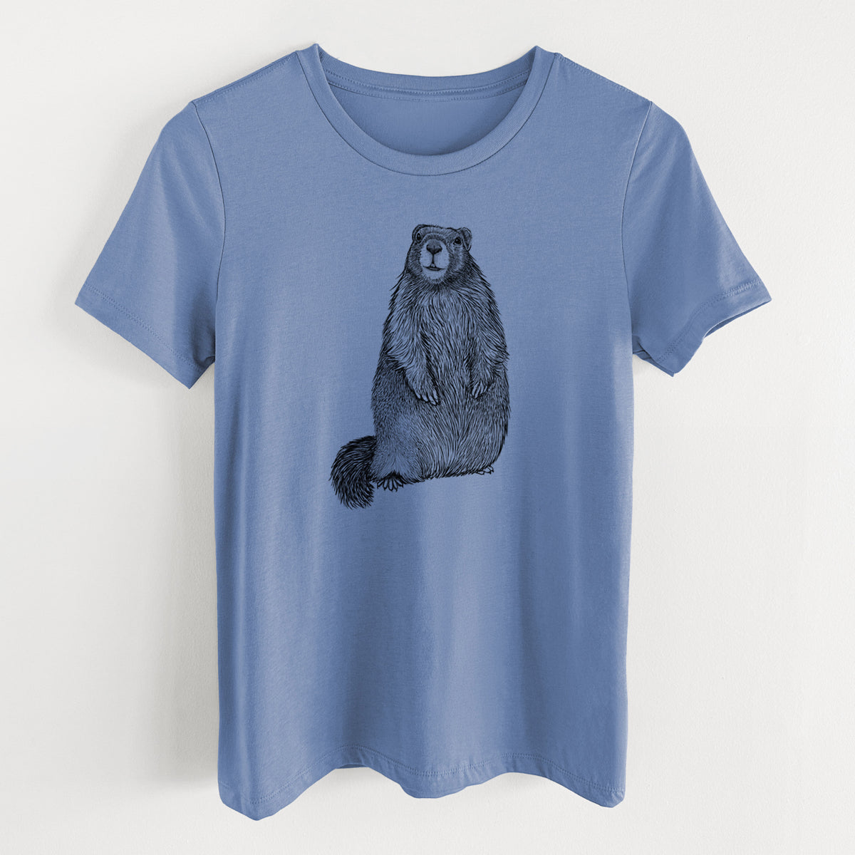 Blue bell women's relaxed fit cotton t-shirt laid flat, printed with a detailed black ink illustration of a marmot standing upright.