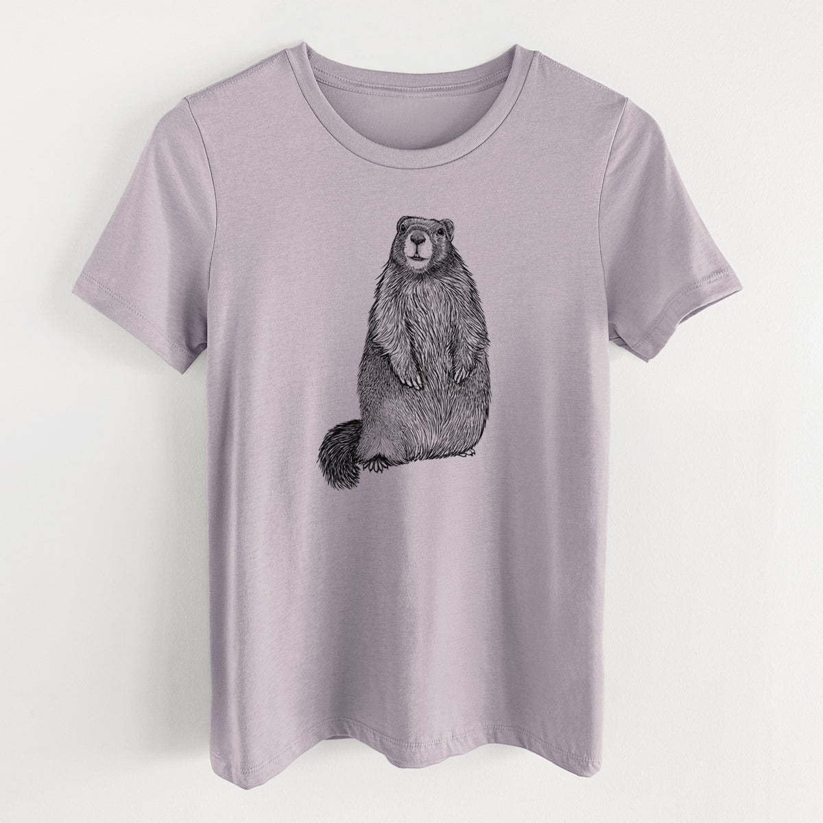 Light violet women's relaxed fit cotton t-shirt laid flat, printed with a detailed black ink illustration of a marmot standing upright.