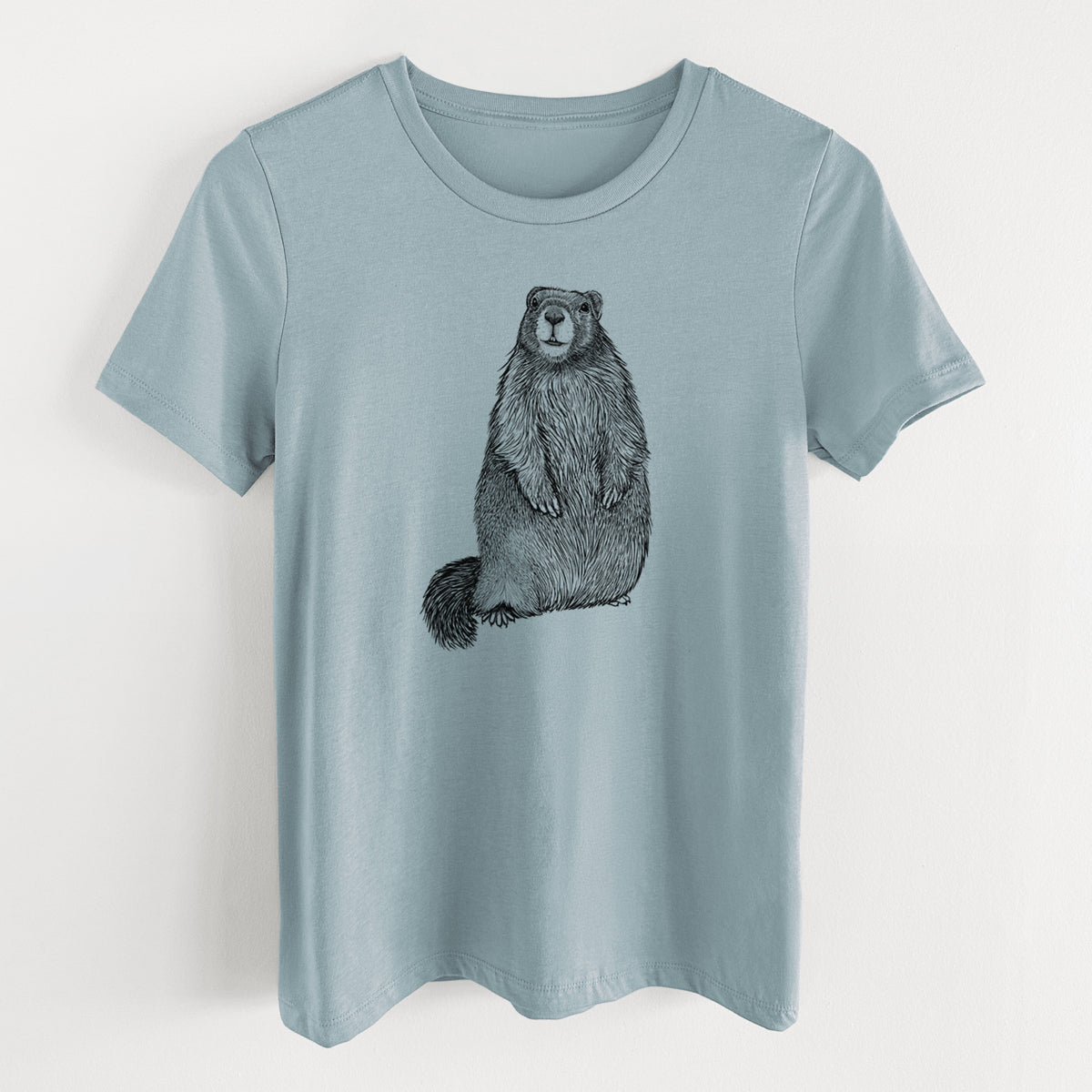 Vintage denim women's relaxed fit cotton t-shirt laid flat, printed with a detailed black ink illustration of a marmot standing upright.